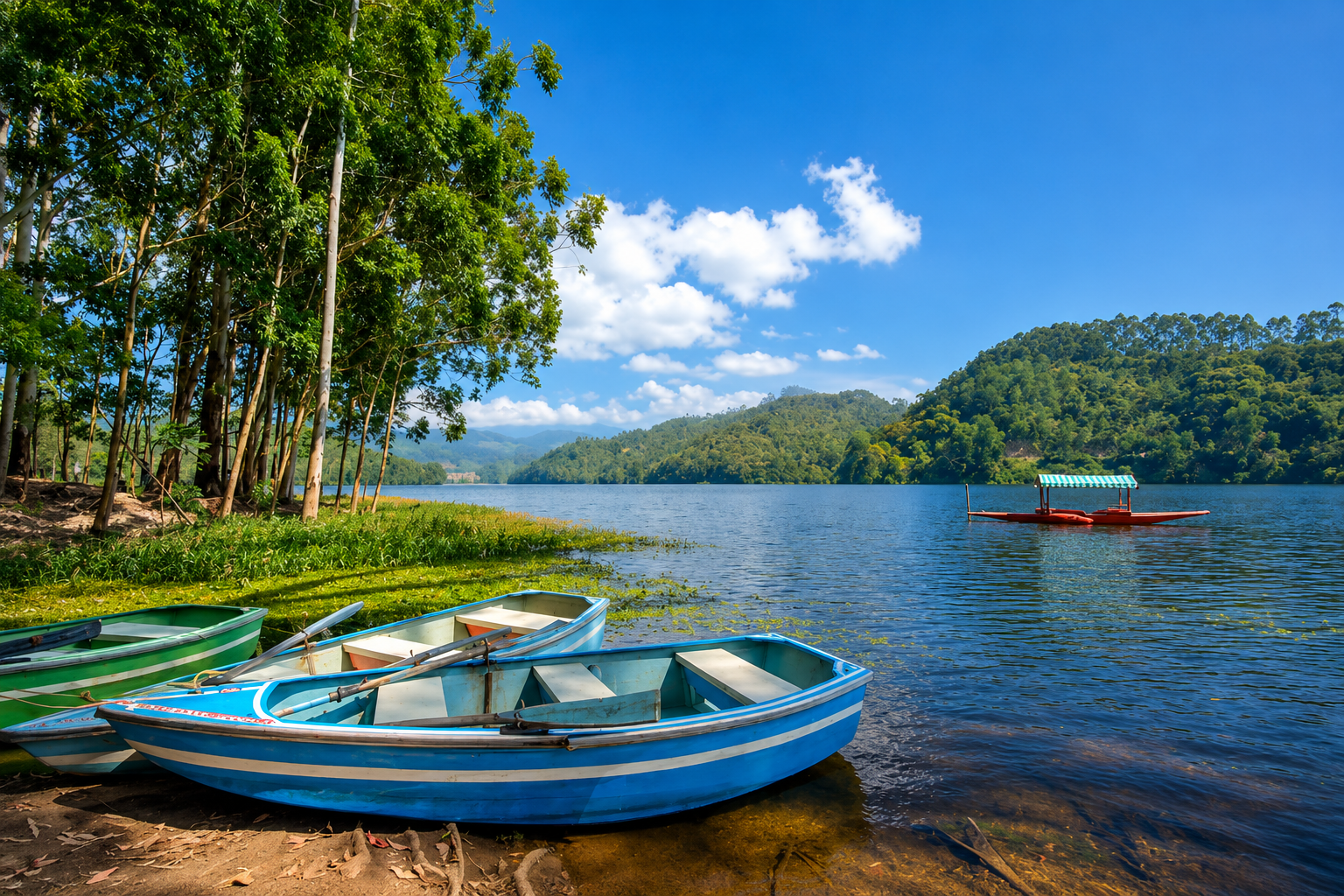 Peaceful Kundala Lake in Munnar with paddle boats, calm waters, forested hills, and blue skies.