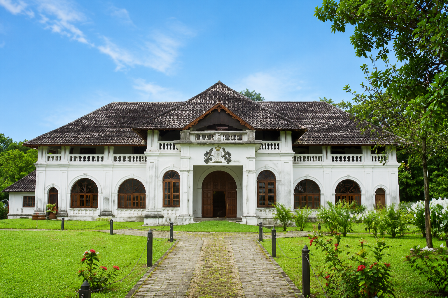 Historic Mattancherry Palace in Kochi showcasing traditional Kerala architecture with landscaped gardens.