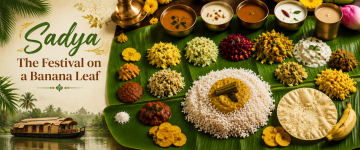 Traditional Kerala Sadya served on a banana leaf with rice, curries, pickles, papad, and festive accompaniments.