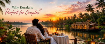 Couple enjoying a romantic candlelight dinner overlooking Kerala backwaters with a luxury houseboat at sunset.