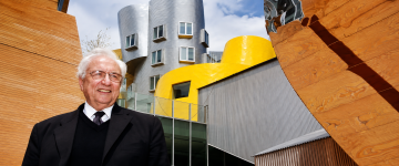 Architect Frank Gehry with distinctive curved contemporary architecture