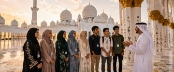 Student group learning about Sheikh Zayed Grand Mosque with an Emirati cultural guide in Abu Dhabi